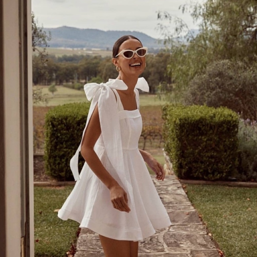 DISSH Aisle White Linen Bow Mini Dress